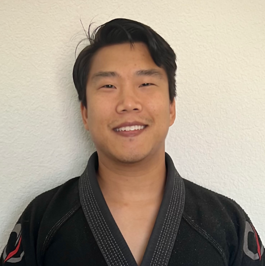 Michael holds a black belt and is the head instructor of the COR kids program. A lifelong martial artist, Michael has trained and taught striking and grappling classes for over a decade and enjoys helping students reach their highest potential.